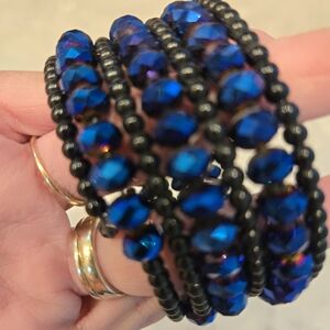 Very beautiful royal blue and black bracelet. Looks like separate bracelets.